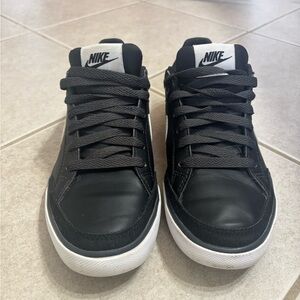 Nike Black and White SB Charge Sneakers